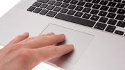 Les Kvinne fikk utslett av Apple-datamaskin