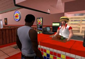 CJ feirer med en burger