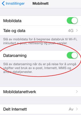 Skru av Dataroaming på en iPhone ved flikke bryteren så den blir hvit.