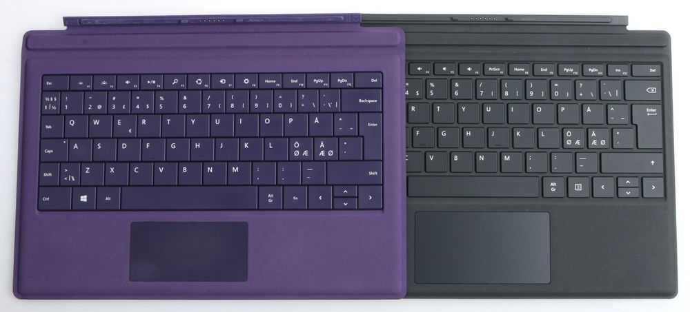 Microsoft Surface Pro 4 Type Cover til høyre.