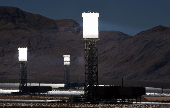 PRIMM, NV - JULY 23: The three towers at the Ivanpah Solar Electric Generating System are shown in operation on July 23, 2014 in the Mojave Desert in California near Primm, Nevada. The largest solar thermal power-tower system in the world, owned by NRG Energy, Google and BrightSource Energy, opened earlier this year in the Ivanpah Dry Lake and uses 347,000 computer-controlled mirrors to focus sunlight onto boilers on top of three 459-foot towers, where water is heated to produce steam to power turbines providing power to more than 140,000 California homes.   Ethan Miller/Getty Images/AFP== FOR NEWSPAPERS, INTERNET, TELCOS & TELEVISION USE ONLY == 