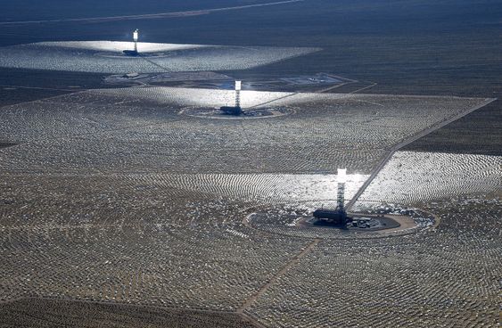 PRIMM, NV - FEBRUARY 20: The Ivanpah Solar Electric Generating System is seen in an aerial view on February 20, 2014 in the Mojave Desert in California near Primm, Nevada. The largest solar thermal power-tower system in the world, owned by NRG Energy, Google and BrightSource Energy, opened last week in the Ivanpah Dry Lake and uses 347,000 computer-controlled mirrors to focus sunlight onto boilers on top of three 459-foot towers, where water is heated to produce steam to power turbines providing power to more than 140,000 California homes.   Ethan Miller/Getty Images/AFP== FOR NEWSPAPERS, INTERNET, TELCOS & TELEVISION USE ONLY == 