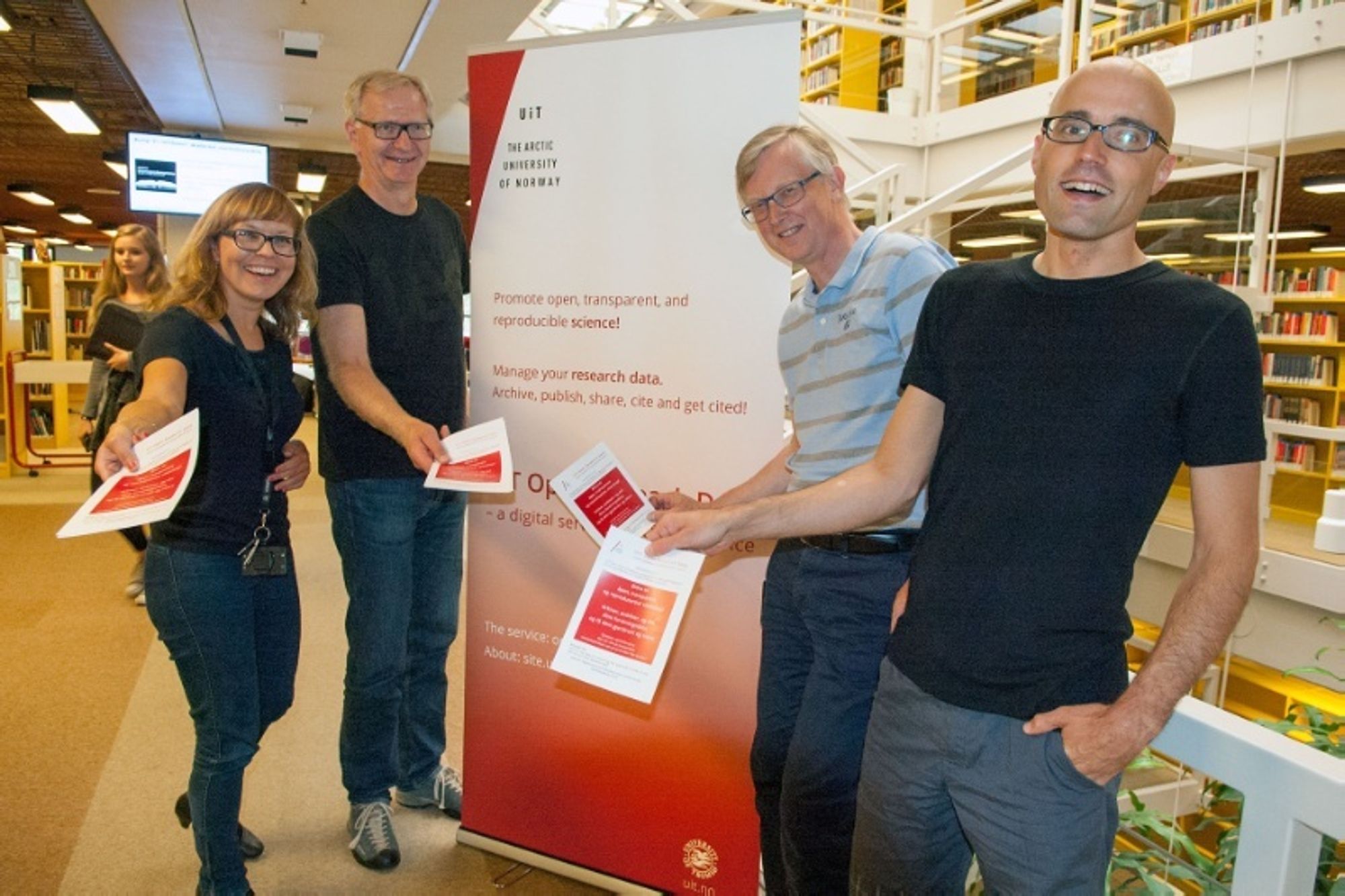 Helene Andreassen, Leif Longva, Stein Høydalsvik og Philipp Conzett ved Universitetsbiblioteket gleder seg til lanseringen.
