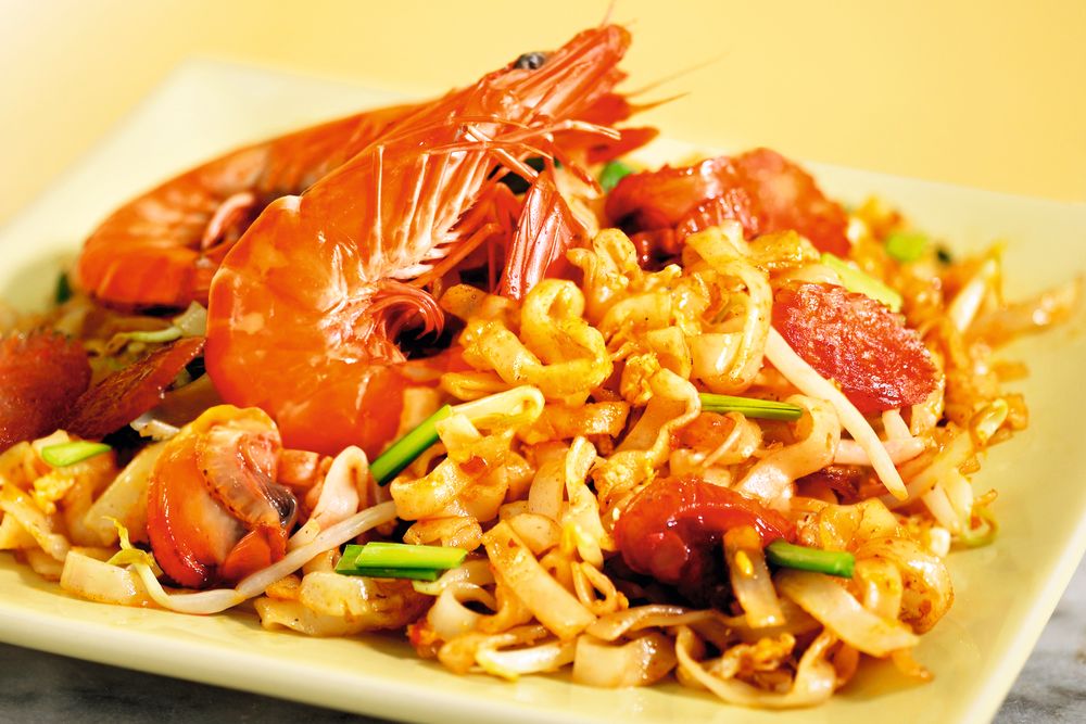 Char kuay teow er en populær nudelrett i Singapore.
