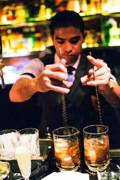 Manhattans senior bartender Cedric Mendoza .