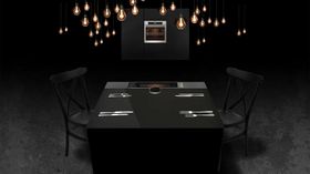 Designskisse for AEGs arrangement hos Flying Culinary Circus. Gjestene kan med kontrollhjulet på bordet selv stille inn ønsket kjernetemperatur..