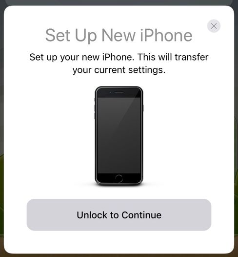 Når den gamle telefonen oppdager at en ny telefon har kommet inn i iCloud-familien din, hjelper den til med oppsettet.