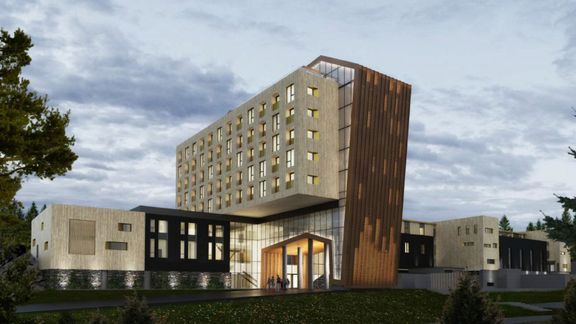 The Well bygger hotell