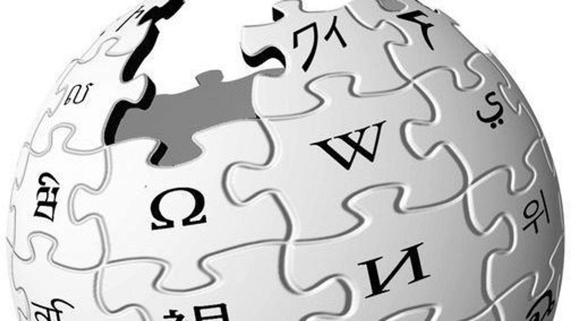 Wikipedia-logoen: En klode laget av puslespillbrikker med bokstaver fra forskjellige skriftspråk på brikkene.