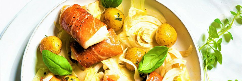 Pakk fisken inn i parmaskinke og du får ekstra mye smak