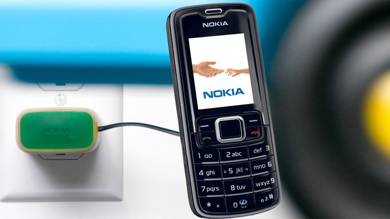 Nokia 3110 Classic. I bakgrunnen er et konsept på en miljølader fra Nokia.