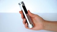 Mobiltelefonen som går på Cola
