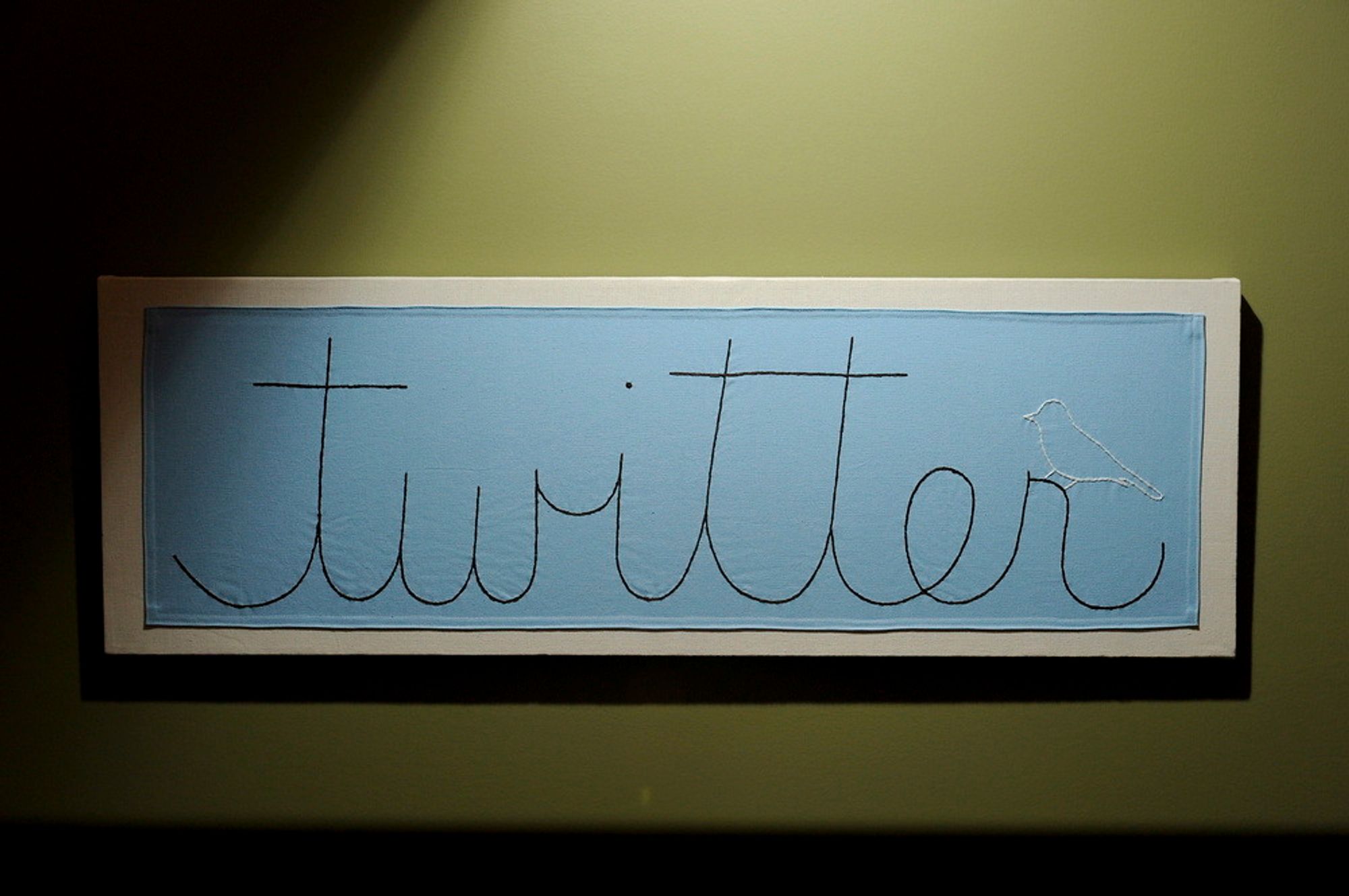 TWITTER: Et kunstverk i et konferanserom i Twitters hovedkvarter i San Francisco.  