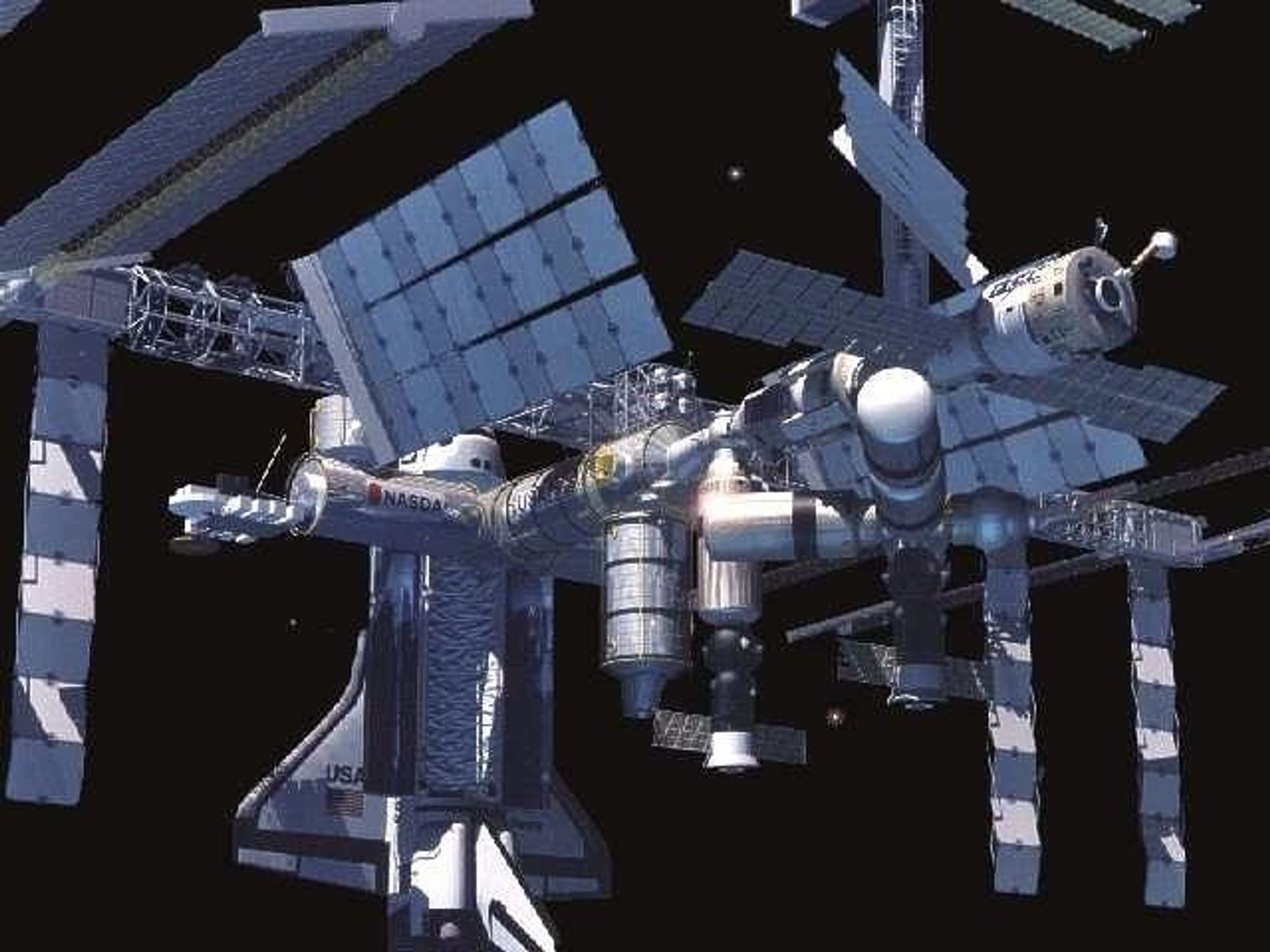 DOKKING: I desember kan du se dette på TV: Da dokker den første romfergen på to år, med den internasjonale romstasjonen ISS. FOTO: NASA
