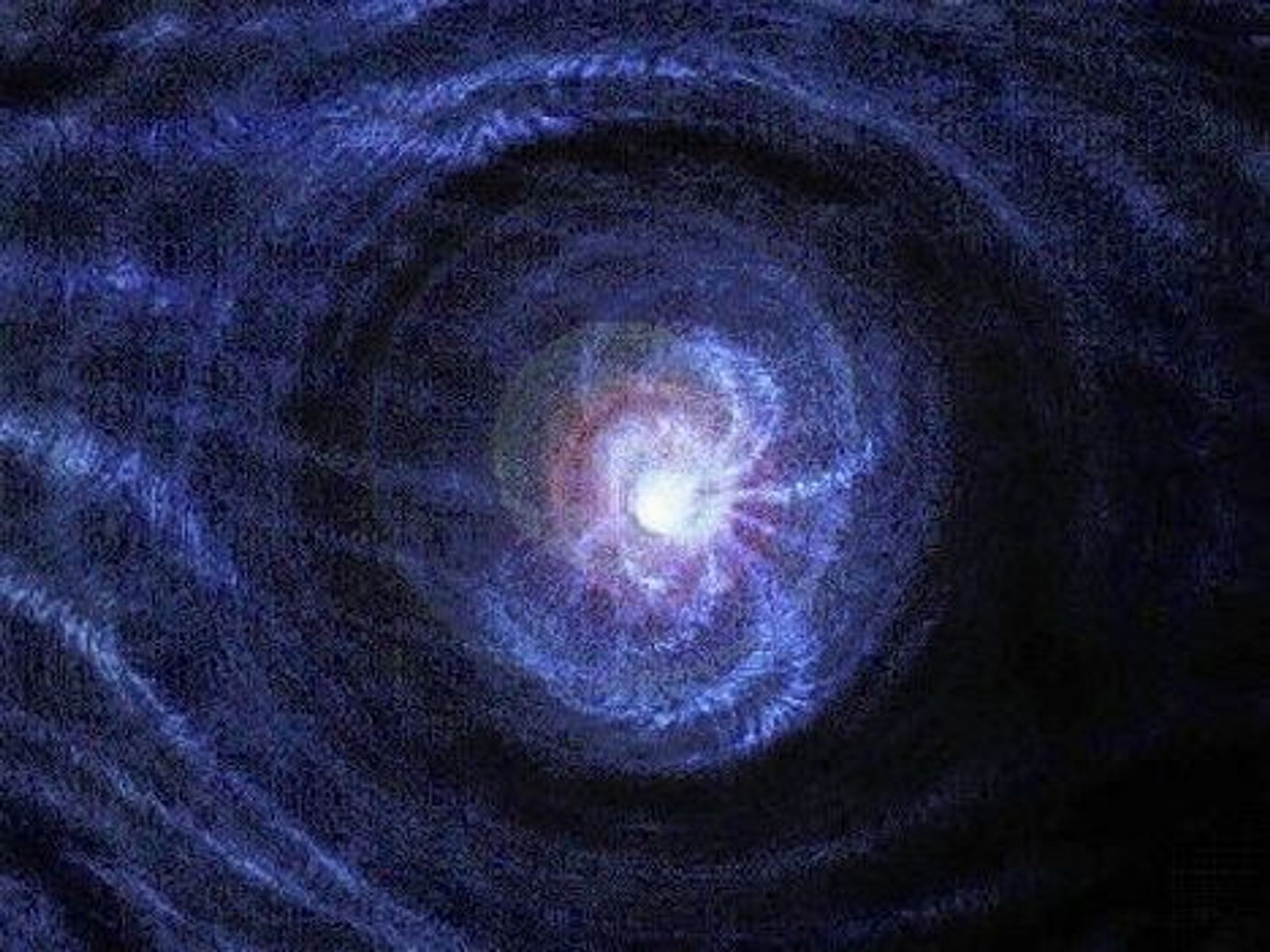 GLOHETT: Kjernen i galaksen NGC 3516 har en masse tilsvarende 10 til 50 soler, med en gravitasjon som gir en materietemperatur på titalls millioner grader. FOTO: NASA