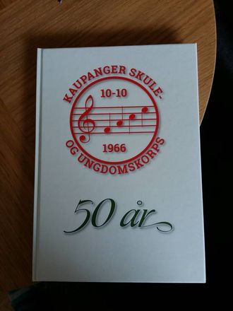BOK: Korpset har i samband med 50-årsjubileumet sitt gitt ut bok om historia si. Privat foto