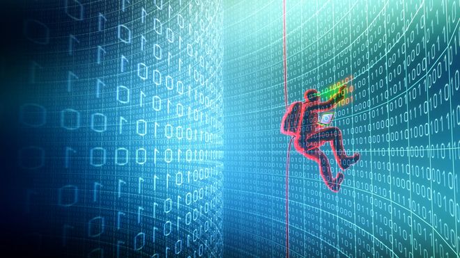 Hacker som klatrer på en vegg av nuller og ettall.