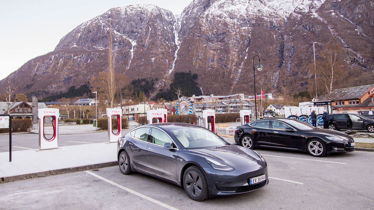 Will Tesla open public charging stations in the third quarter of next year?