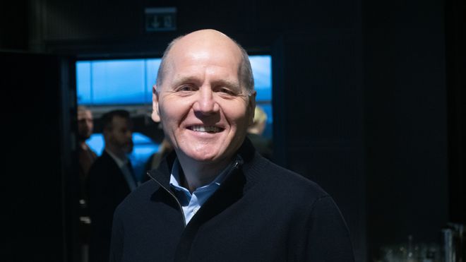 Sigve Brekke smilende.