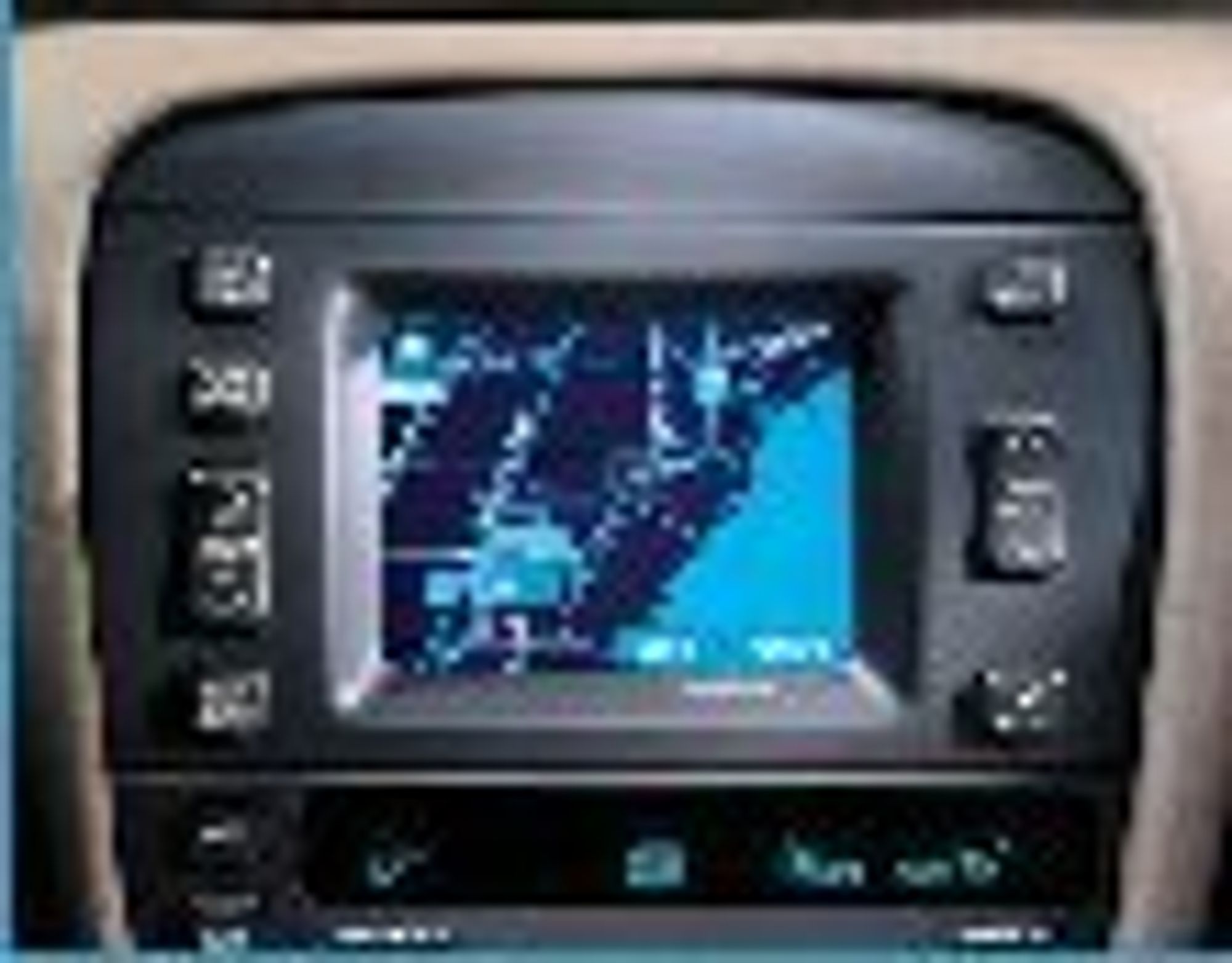 GPS i dashbordet til en Cadillac Seville fra 1999.