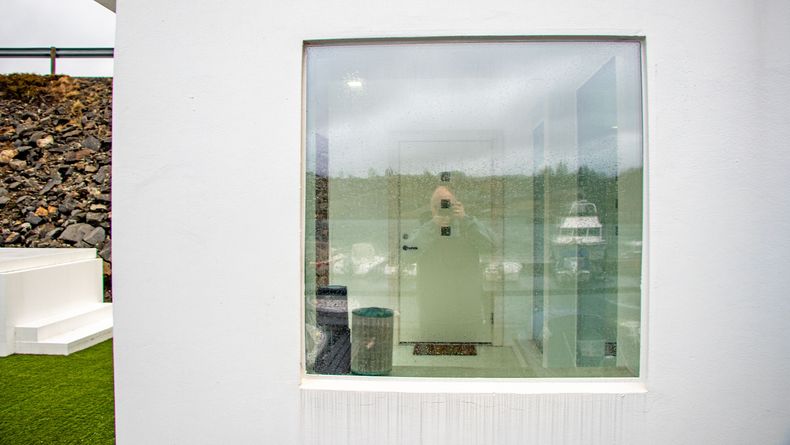 The windows are glass built directly into the wall.  Eliminates thermal bridges.