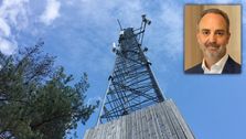 Joe Baguley er teknisk direktør i EMEA for VMware og skriver i denne kronikken om hvordan teleselskaper kan bli mer energivennlige. Innfelt i et bilde av en basestasjon.