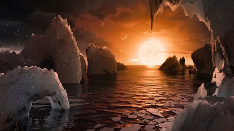 Dette bildet viser en kunstners oppfatning av hvordan overflaten til eksoplaneten TRAPPIST-1f kan se ut, basert på tilgjengelige data om dens diameter, masse og avstander fra vertsstjernen. James Webb-teleskopet finner ingen atmosfære på den jordlignende eksoplaneten.